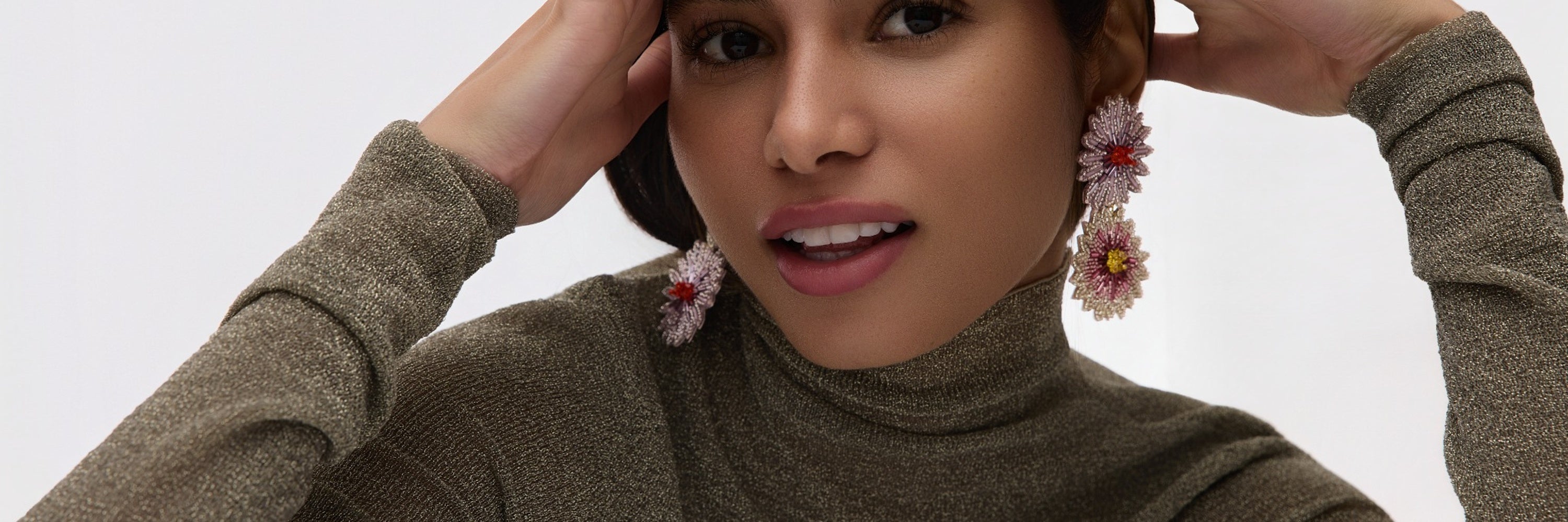 Mignonne Wearing Mini Brown Owl Earrings