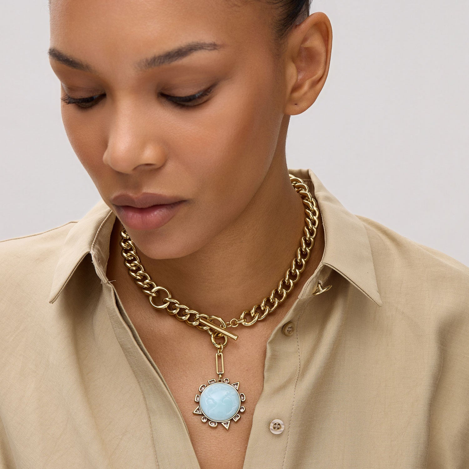 Crystal and Gold Compass Chain Pendant Necklace Styled on Model's Neck