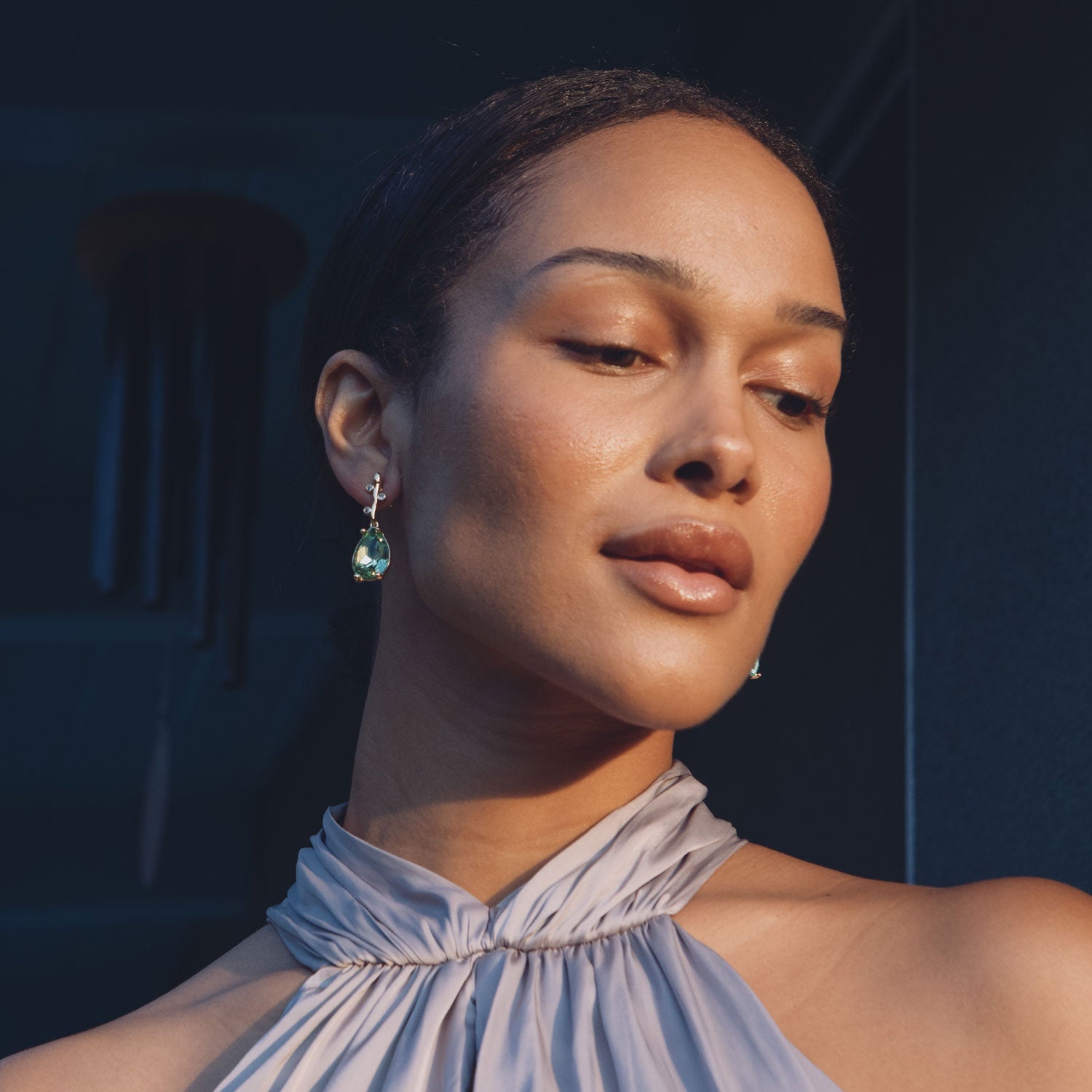 Blue, Green, and Clear Crystal Drop Earrings Styled on Model