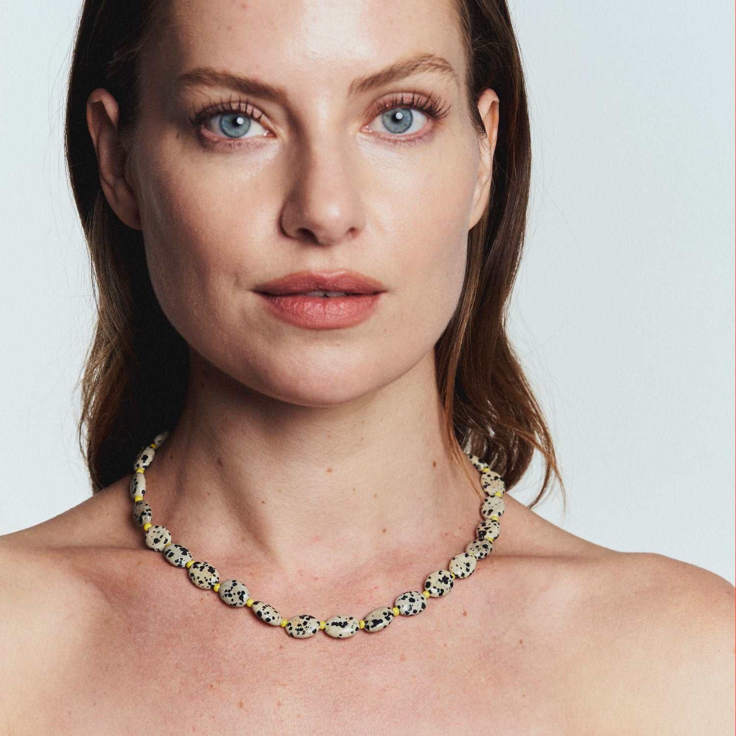 Brown and Black Stone and Yellow Bead Strand Necklace Styled on Model