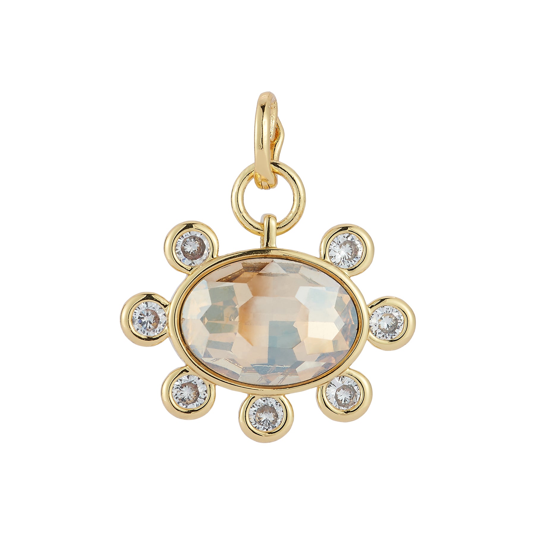 Crystal and gold charm on white background