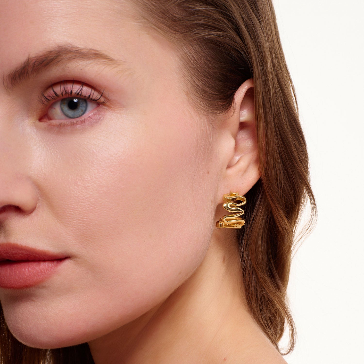 Gold Squiggle Hoop Earrings Styled on Model