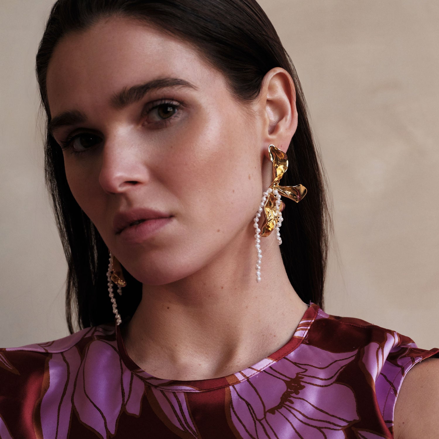 Gold and Pearl Flower Dangle Earrings Styled on Model