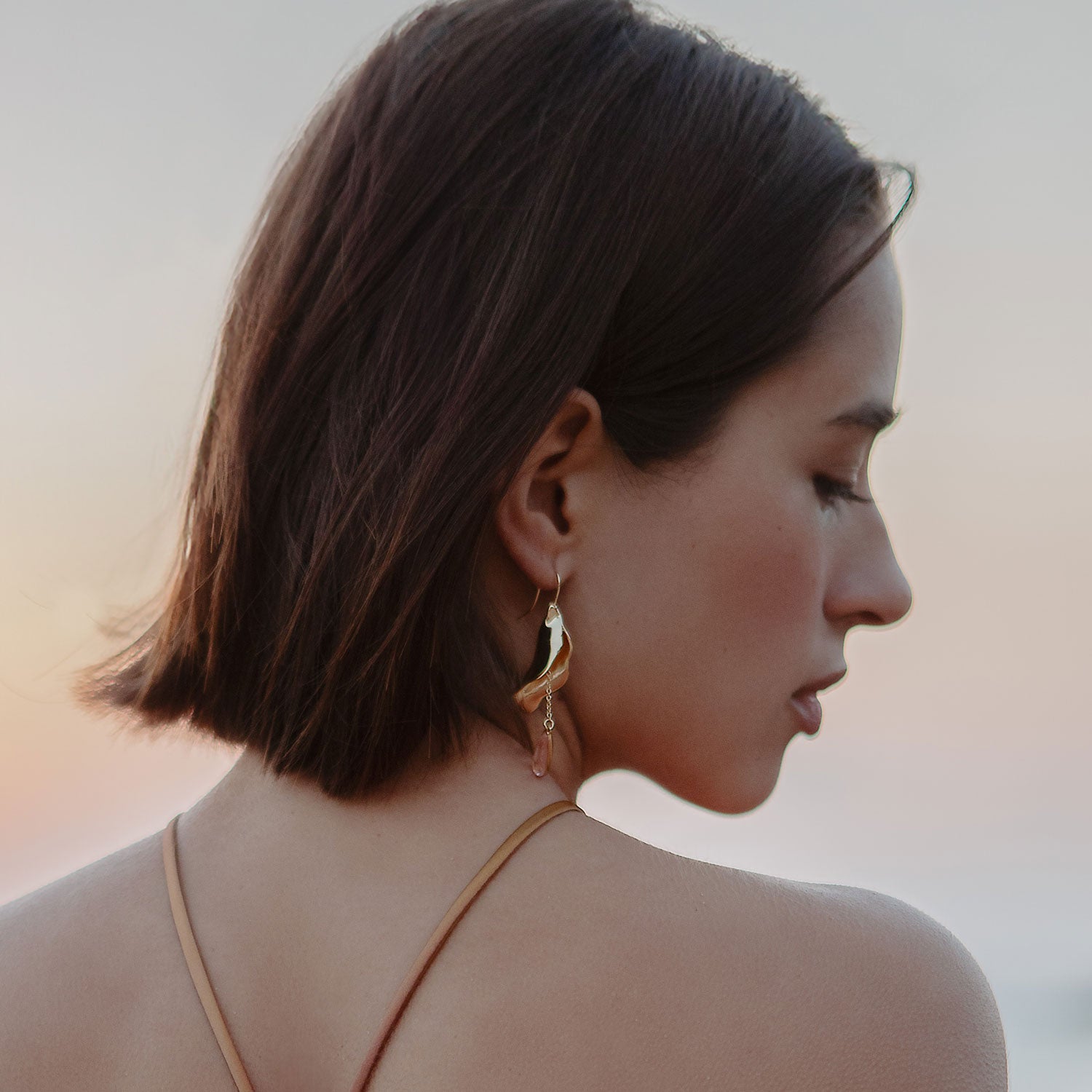Pink Crystal and Gold Drop Earrings Styled on Model