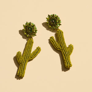 Green Beaded and Crystal Drop Cactus Earrings on Cream Background