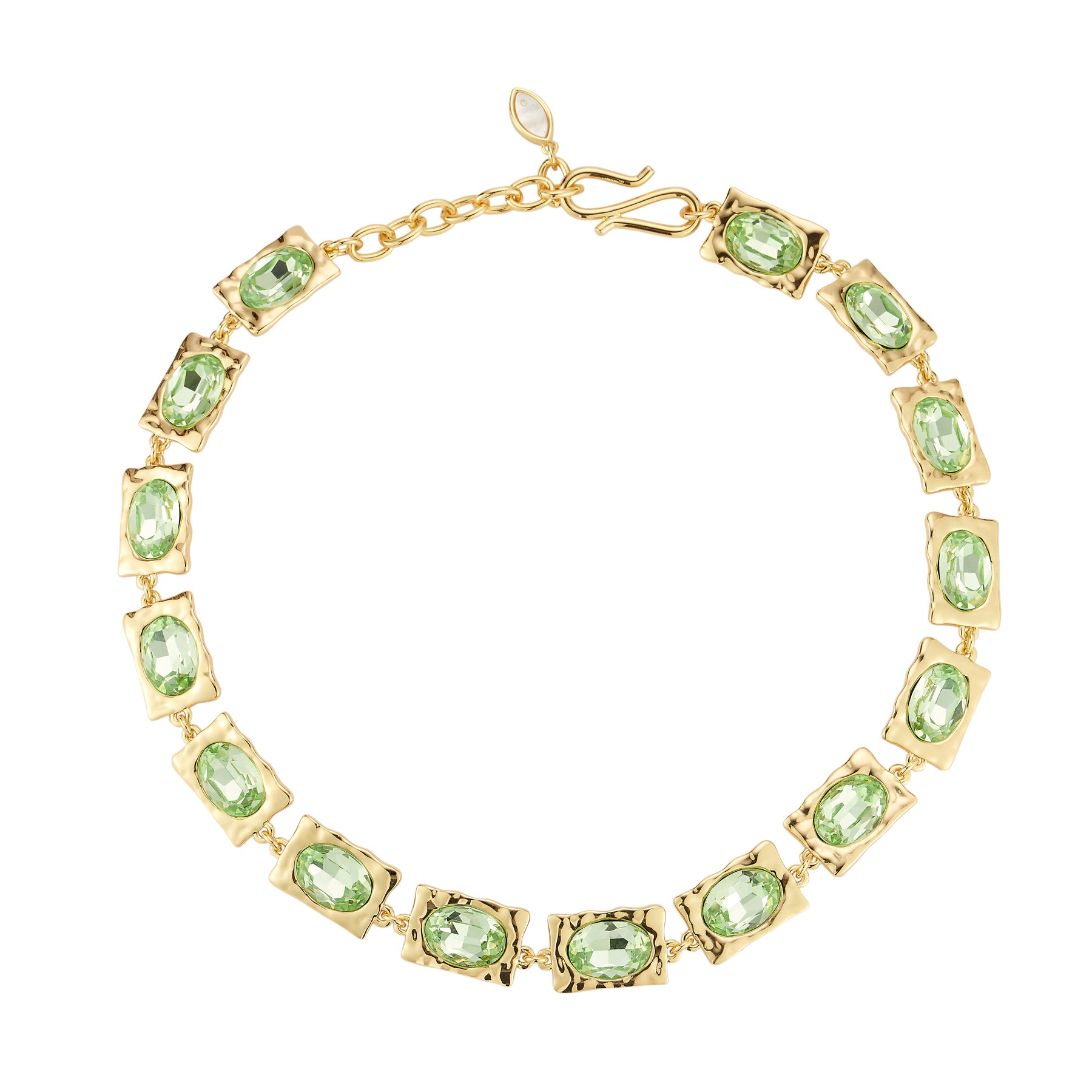 Gold Necklace With Green Gemstones On A White Background