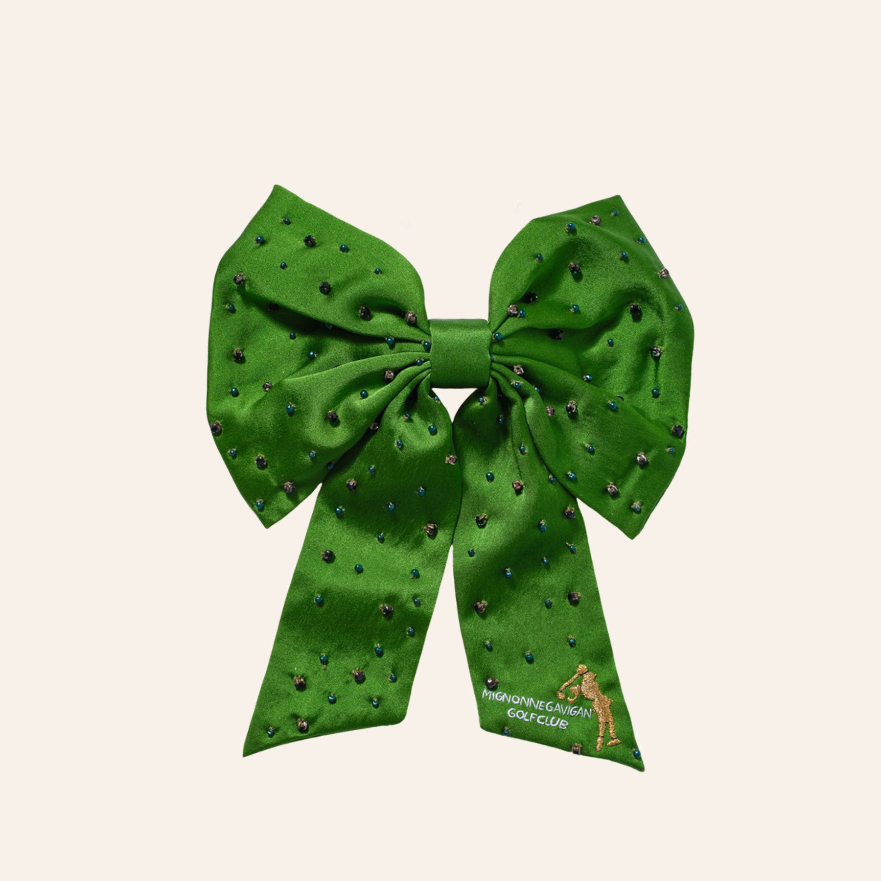 Green Crystal Embroidered Hair Bow on Tan Background