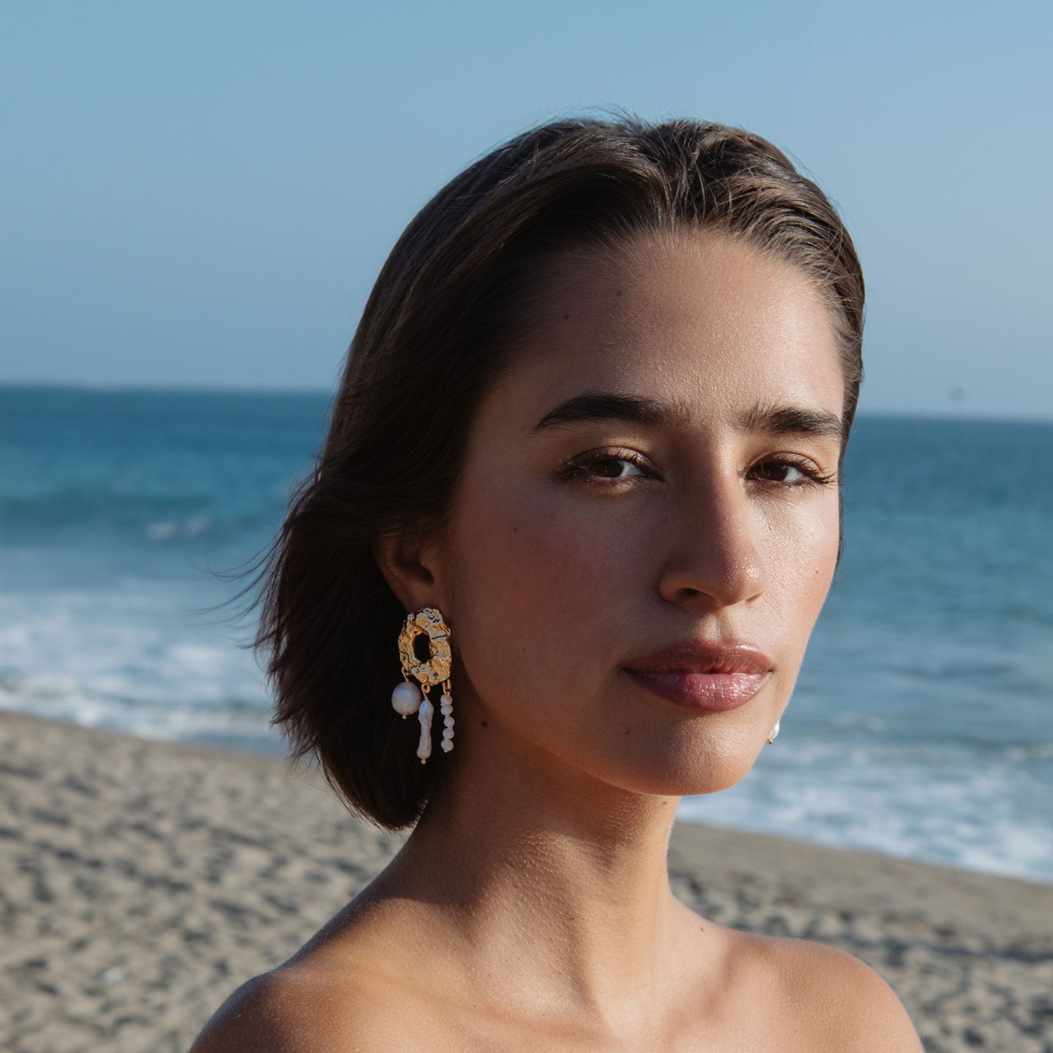 Freshwater Pearl and Hammered Gold Drop Earrings Styled on Model