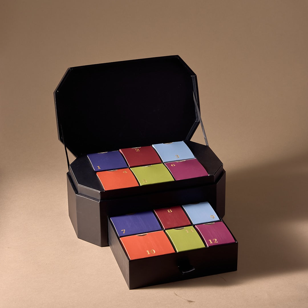 Black featuring multi-colored smaller boxes with numbers on brown background