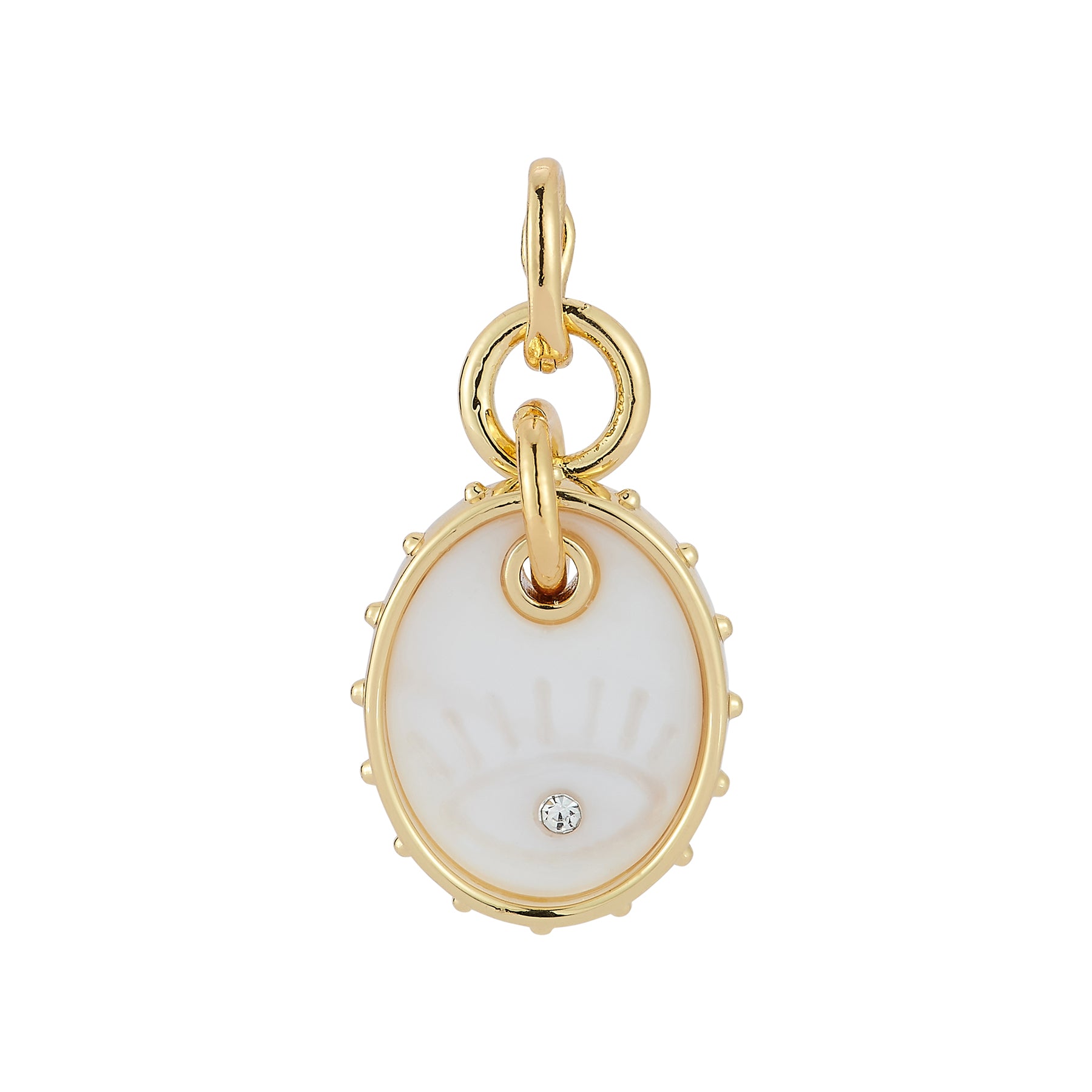 Gold charm with mother of pearl carved evil eye and crystal on white background