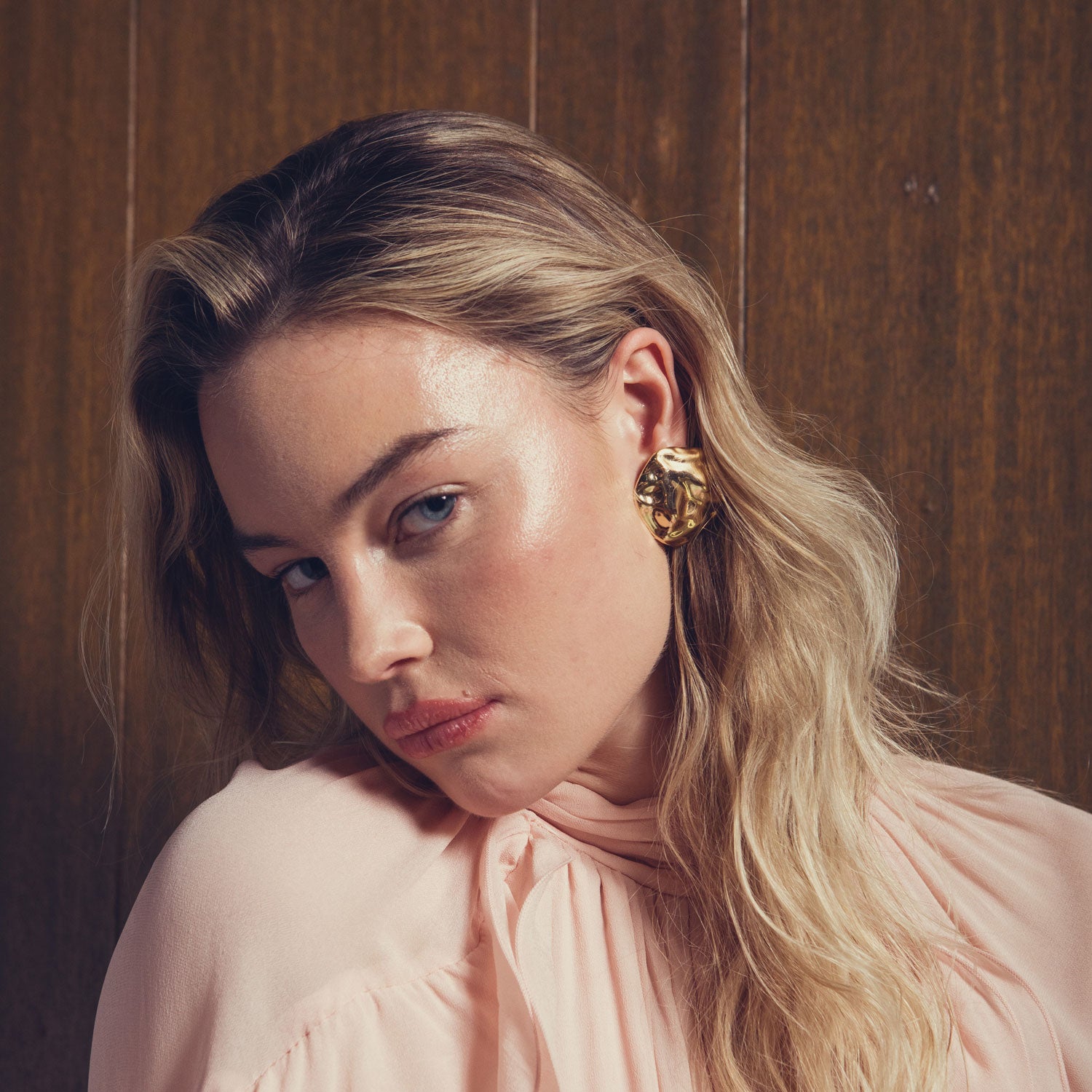 Gold Round Stud Earrings Styled on Model