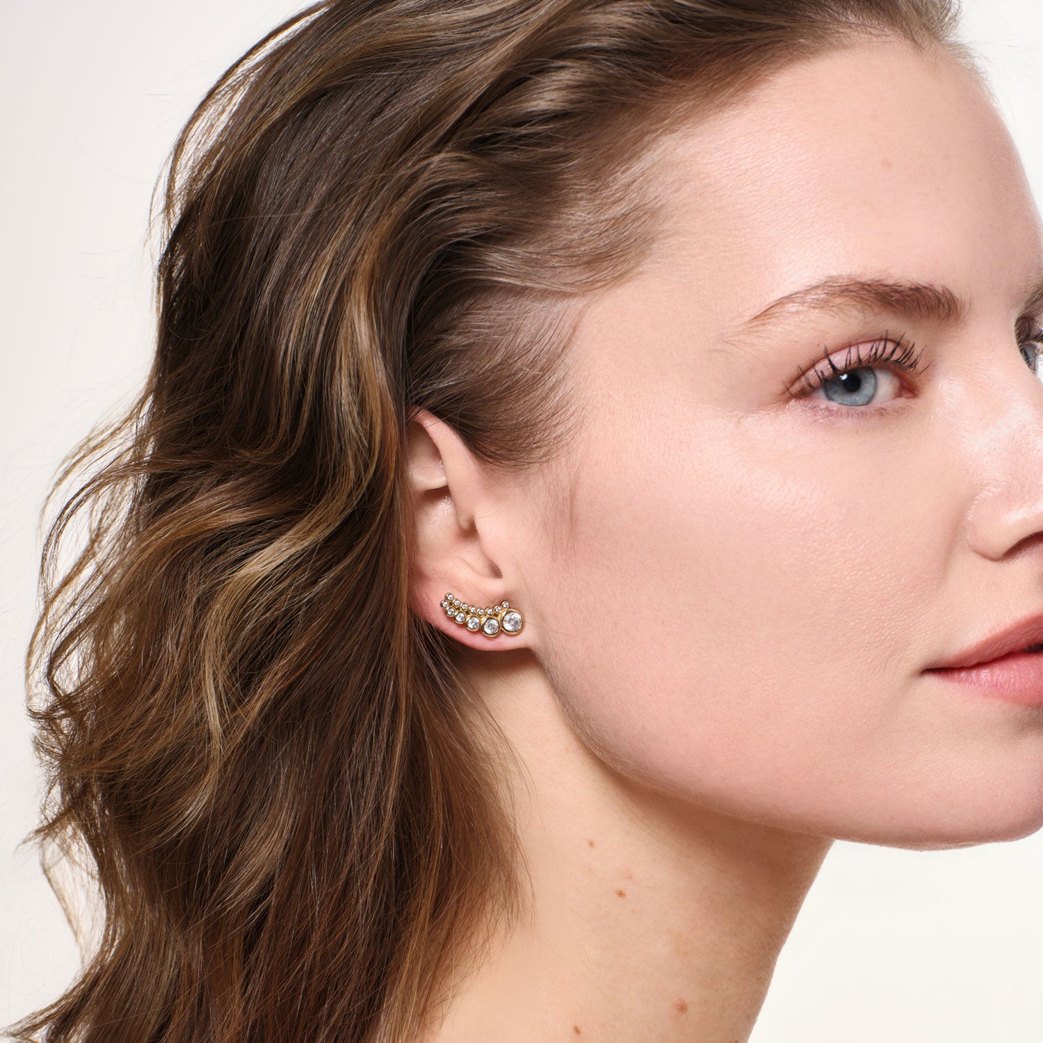 Gold and Crystal Stud Earrings Styled on Model