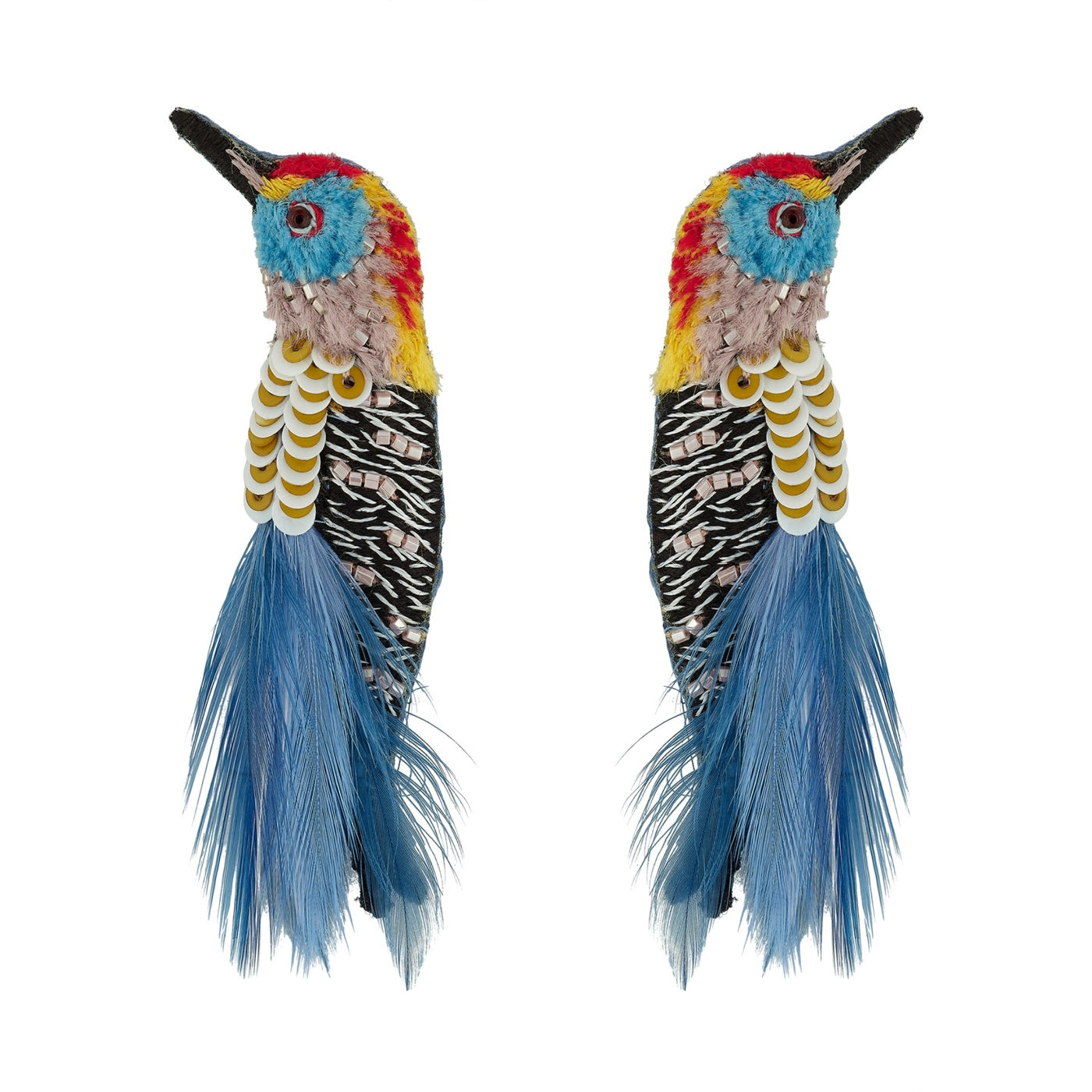 Colorful bird-shaped earrings with blue tails on a white background
