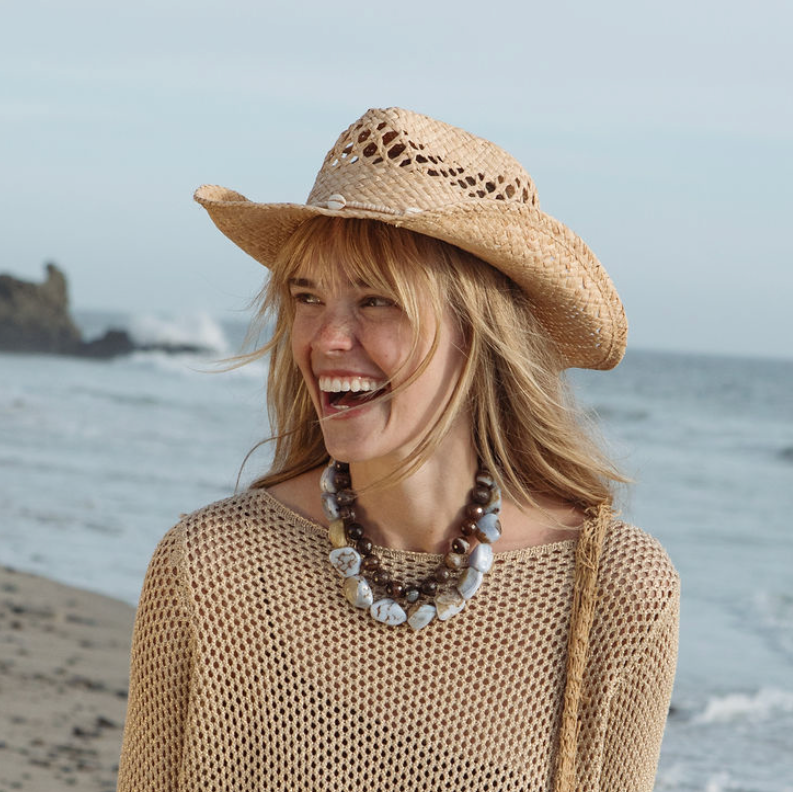 Brown Beaded Strand Necklace Styled on Model with Chunky Blue Strand Necklace