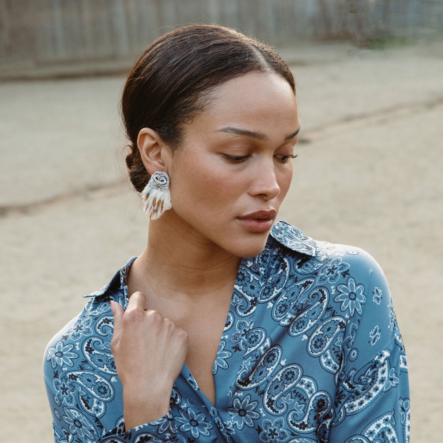 White and Brown Feather and Bead Owl Stud Earrings Styled on Model