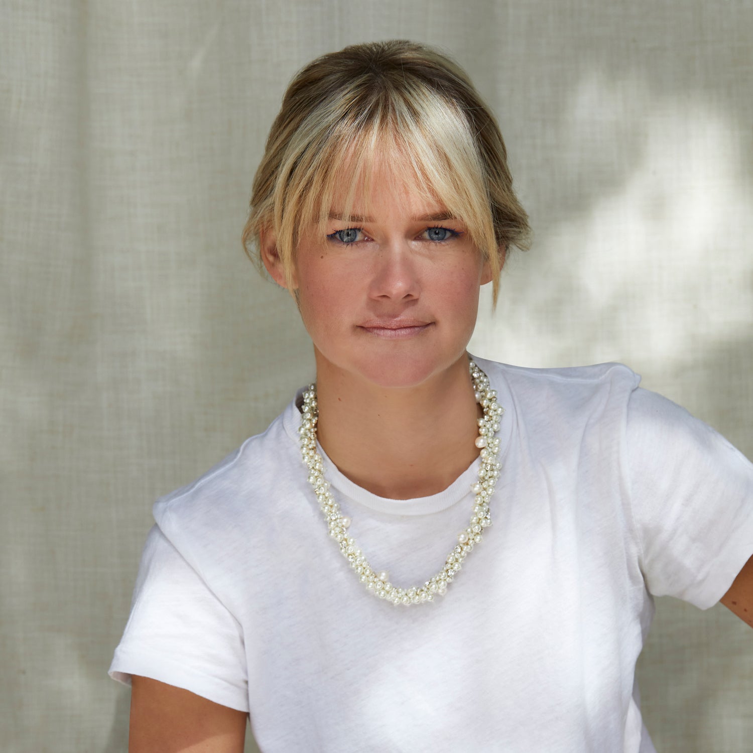 White Pearl and Crystal Collar Necklace Styled on Maggie in White T-Shirt