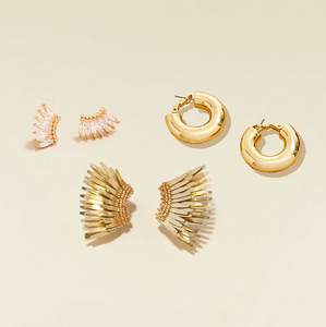 classic earrings bundle of gold hoop earrings, mini crystal earrings, and mini madeline gold winged earrings