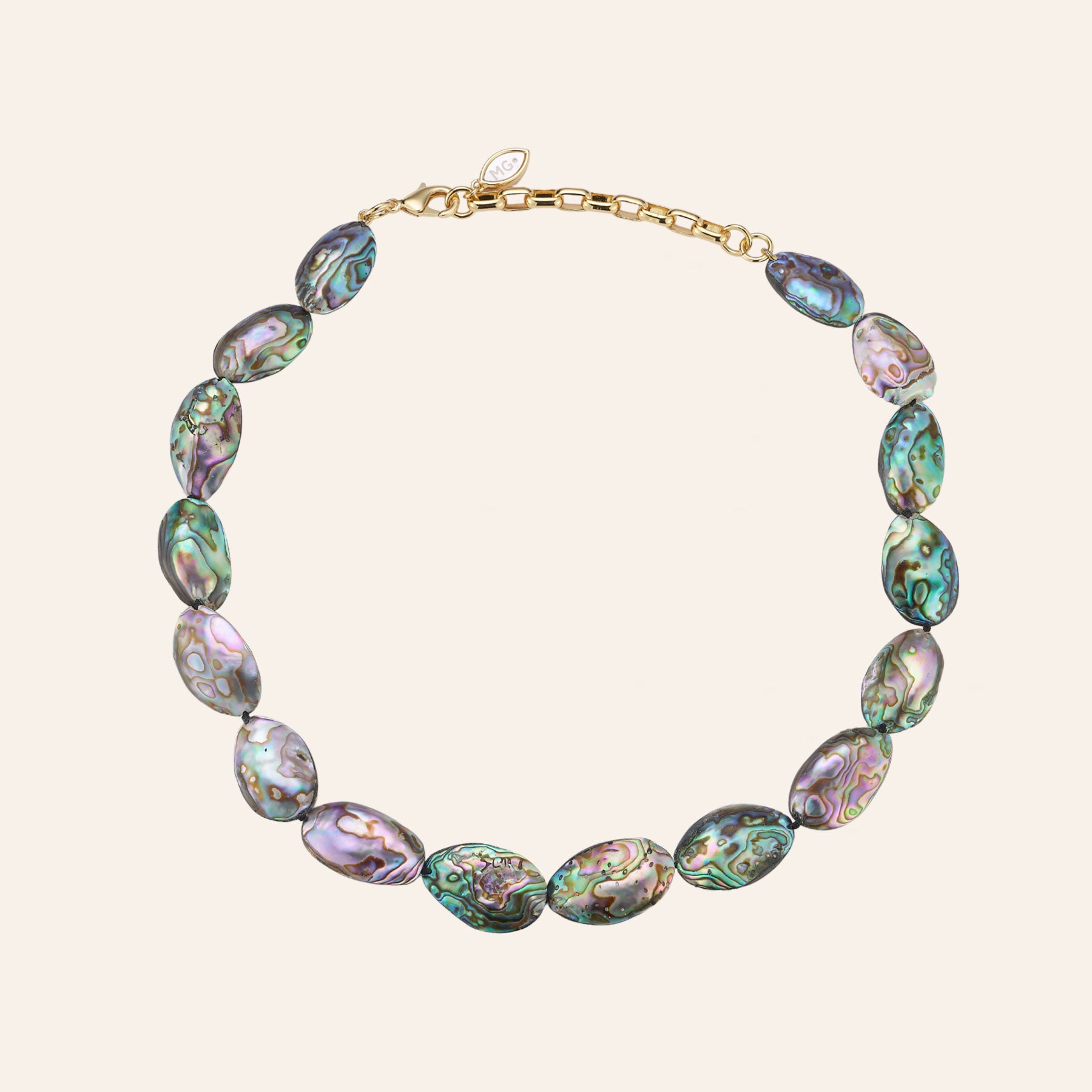 Abalone Shell Necklace on Tan Background