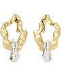 Gold and silver earrings on a white background