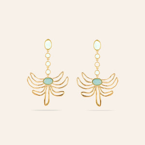 Green Blue Crystal and Gold Flower Drop Earrings on Cream Background