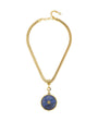 A gold snake chain necklace featuring a circular blue and white stone pendant with a small gold star detail in the center, displayed on a clean white background.