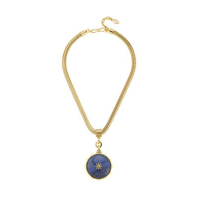 A gold snake chain necklace featuring a circular blue and white stone pendant with a small gold star detail in the center, displayed on a clean white background.