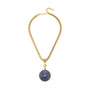 A gold snake chain necklace featuring a circular blue and white stone pendant with a small gold star detail in the center, displayed on a clean white background.