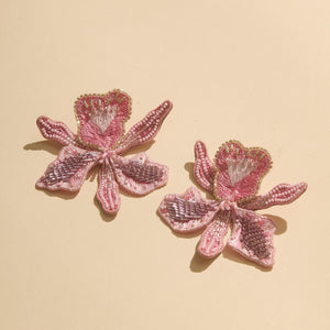 Beaded and Embroidered Light Pink Flower Stud Earrings on Flat Cream Background