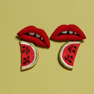 Beaded Red Lips and Embroidered Red White Green and Black Watermelon Drop Earrings on Green Background