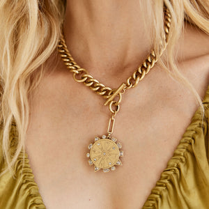 Gold and Crystal Compass Charm Chain Pendant Charm Necklace Styled on Model's Neck