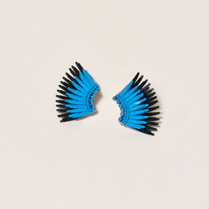 Black and Blue Bead and Sequin Wing Stud Earrings on Tan Background