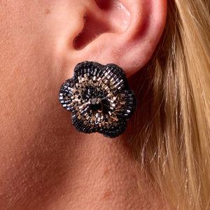 Black and Silver Beaded Flower Stud Earrings Styled on Model's Ear