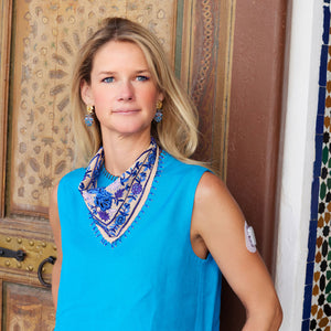 Tan Silk with Blue Embroidery Bandana Styled on Maggie in Blue Outfit with Beetle Drop Earrings