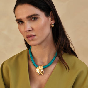 Turquoise Cord and Gold Shell Charm Pendant Necklace Styled on Model