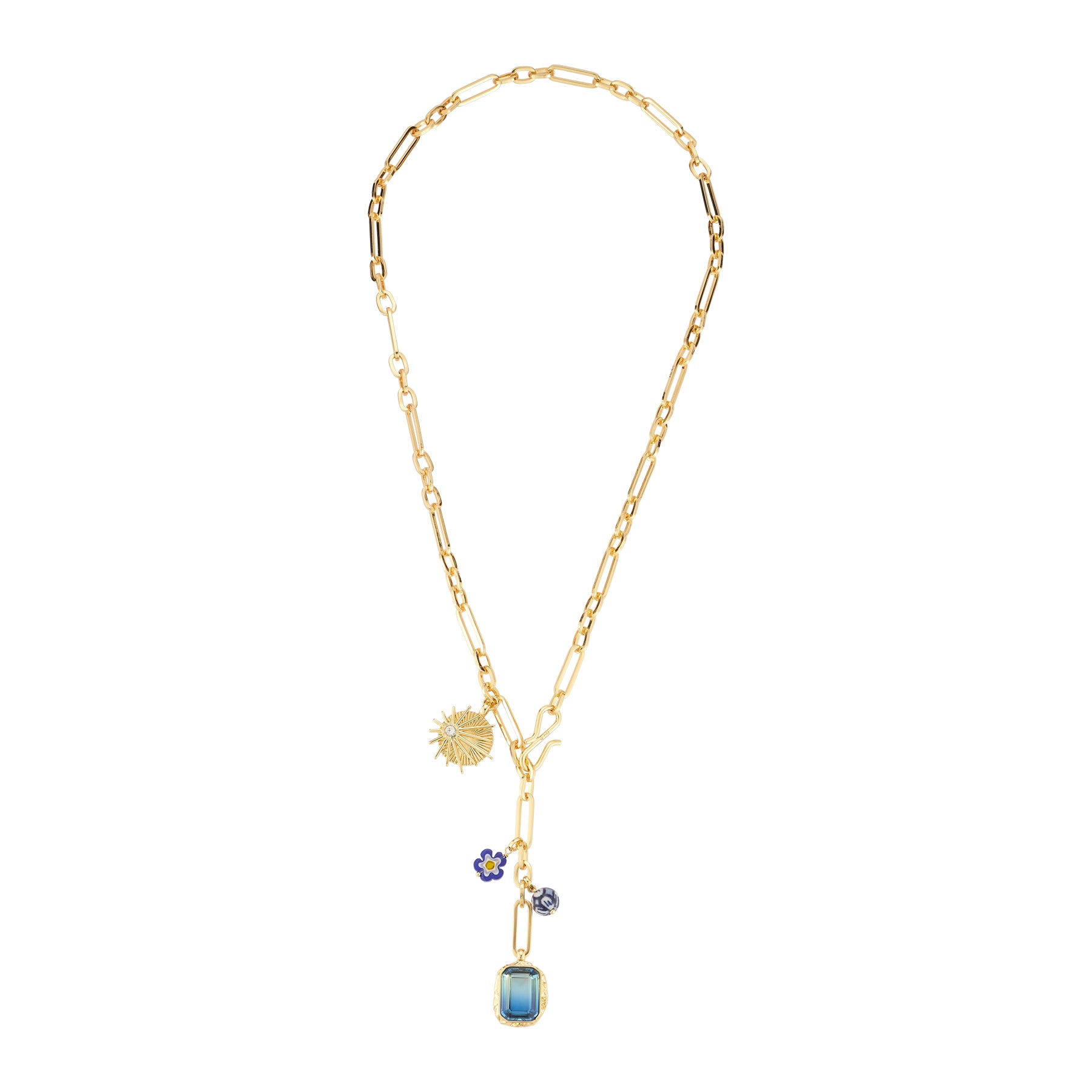 Gold necklace with blue pendant on white background