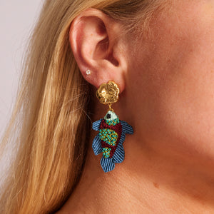 Blue, Green, and Brown Beaded and Embroidered Fish Drop Earrings with Gold Top on Model's Ear