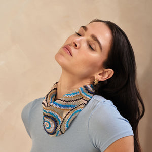 Blue, Brown, and Peach Embroidered Spirals Scarf Necklace Styled on Model