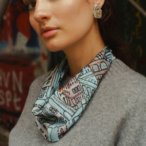 Blue Fabric Scarf Necklace with City Scape Embroidered Styled on Model