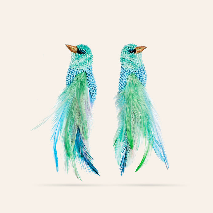 Blue and Green Embroidered Feather Bird Earrings on Cream Background