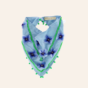 Blue Bandana with Blue Flower and Green Bead Embroidery on Tan Background