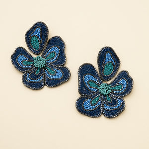 Navy and Teal Beaded Statement Flower Drop Earrings On Ivory Background