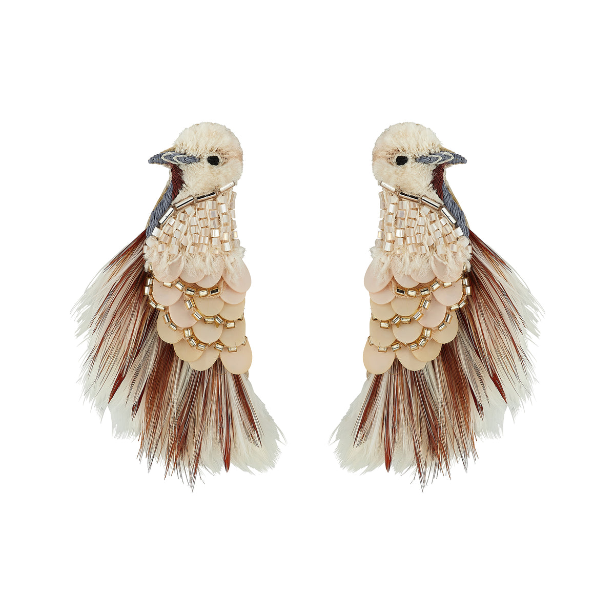 A pair of statement earrings shaped like birds, featuring cream-colored feathers, scalloped beige and gold beadwork, and dark brown feather accents, set against a plain white background.
