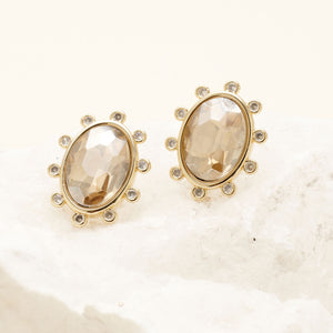 Champagne Crystal Studs Staged on Stone with Cream Background