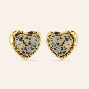 Black and Brown Stone and Gold Heart Stud Earrings on Tan Background