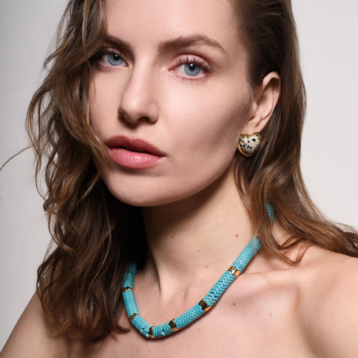 Black and Brown Stone and Gold Heart Stud Earrings Styled on Model