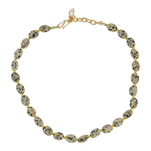 Brown and Black Stone and Yellow Bead Strand Necklace on Flat White Background
