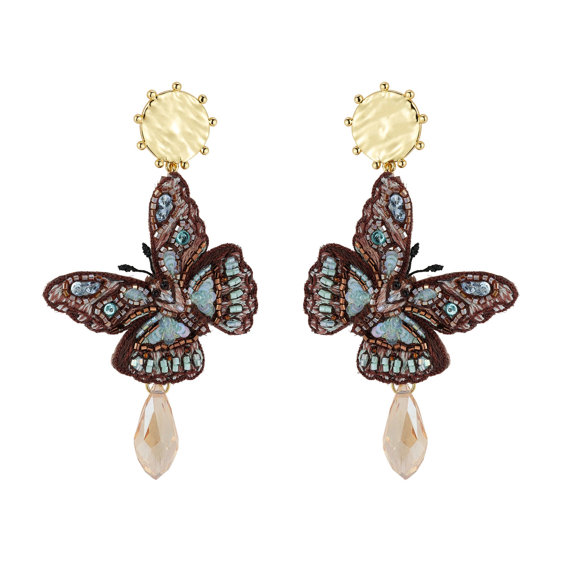 Butterfly earrings with gemstones and a central yellow stone on a white background