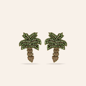 Green and Brown Beaded Palm Tree Studs on Tan Background