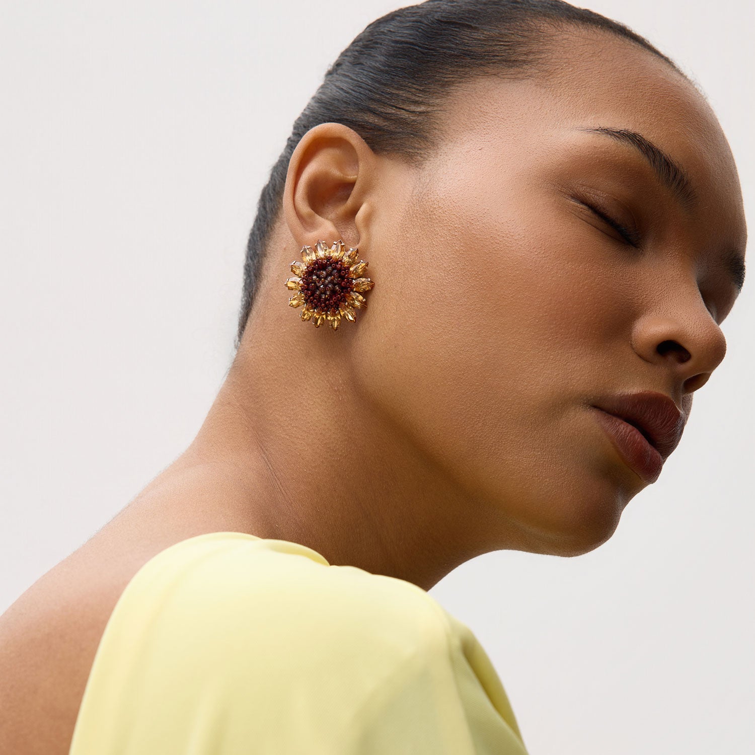 Bead and Crystal Sunflower Stud Earrings Styled on Model