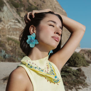 Butter Yellow Bandana with Blue Floral Embroidery Styled on Model with Blue Beaded Floral Earrings